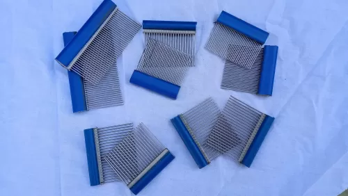 Comb for tension box